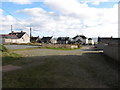 J3619 : Houses on Kilkeel Road, Annalong, viewed from the former Coastguard Station by Eric Jones