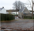 Houses at the entrance to a caravan park east of Swanbridge