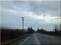 SU0896 : Staggered crossroads on old route of A419 by David Smith