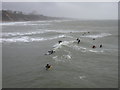 SZ0890 : Bournemouth: surfers enjoy a wet New Year’s Eve by Chris Downer