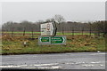 Sign Posts at Low Woodnook A595