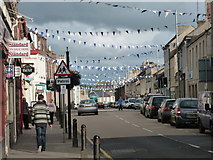 NS7809 : Sanquhar: bunting in the High Street by Chris Downer
