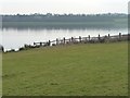 SE3716 : Fence dropping into the lake, Anglers Country Park by Christine Johnstone