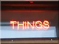 Neon sign at entrance of Grundy Art Gallery