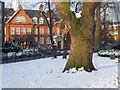 Oakley Square Gardens in snow and the Working Men