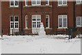 Snowman near the door