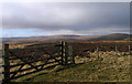 NT8708 : Fence crossing summit of Inner Hill by Trevor Littlewood