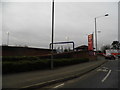 TQ0271 : Roundabout at the entrance to Sainsbury's on The Causeway by David Howard