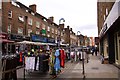 TQ3381 : Clothes rails in Wentworth Street by Steve Daniels