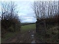 Muddy start to the footpath to Weekfield Farm