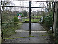 Gate to fishing pond, locked