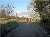 SU4344 : B3048 passes the gates to Longparish House by Stuart Logan