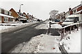 A view up snowy Almond Drive, Malpas, Newport