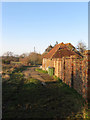 TQ1414 : Outbuilding, Upper Buncton Farm by Simon Carey