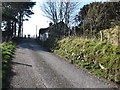 Approaching a disused traditional cottage on Clontafleece Road