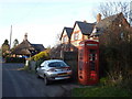 Motcombe: phone box on The Street