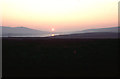 HY3806 : Sunset over the Loch of Kirbister, from Hobbister Hill by Christopher Hilton