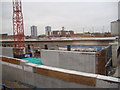 View of the new DLR viaduct under construction from a DLR train at Pudding Mill Lane station