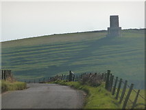 SY9179 : Kimmeridge: the road approaches the bay by Chris Downer