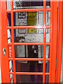 Inside a Telephone Box outside the Flats in Hall Road. NW8