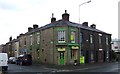 Shop and housing on Belmont Road