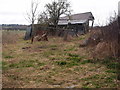 Tired shed by the footpath