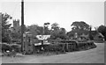 SK7452 : Rolleston: phone box and signpost, 1955 by Sutton family album