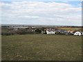 Contrast between permanent dwellings and massed caravans