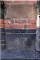 Benchmark on wall pier of #308 Woodborough Road