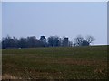 Church Tower at Barnardiston visible above sloping ground