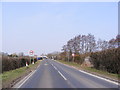 TG1107 : Entering Barford on the B1108 Watton Road by Geographer