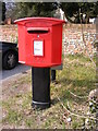 TG2701 : Poringland Post Office Postbox by Geographer
