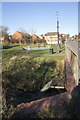 Dieppe Way with culvert over stream in foreground