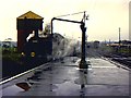 Wareham station, with locomotive filling with water