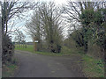 Un-named road ends at entrance to Woodend House