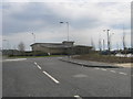 Road leading to Midsummer Place central roundabout in  Solstice Park at Amesbury