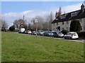 Houses at Tea Green and Village Sign