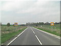 Un-named MoD road approaches entrance to Porton Science Park