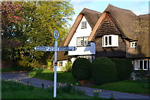 SU3940 : Signpost and thatched cottage, Chilbolton by David Martin