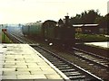 A train from Swanage arrives at Corfe Castle