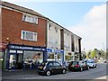 Shops and flats in Kingpost Road Parade, London Road, GU4