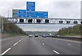 TQ4898 : M25  Half mile sign for the M11  by Julian P Guffogg