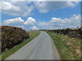 Lane heads northwards up the hill