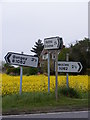 TM3989 : Roadsigns on the B1062 Bungay Road by Geographer
