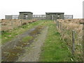 Disused military looking buildings on Cnoc Dubhaig