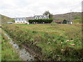 NG7138 : Dwellings at Toscaig by Jennifer Jones