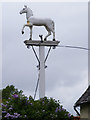 TM1338 : White Horse Public House sign by Geographer