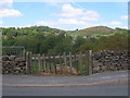 Gateway with benchmark, Smithy Brow, Bollington