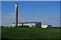 View across field towards Fawley Power Station