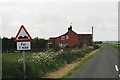 Bumpy  fen road behind North Kyme